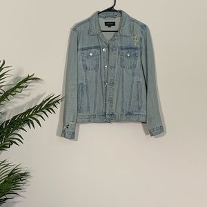 Distressed denim trucker jacket